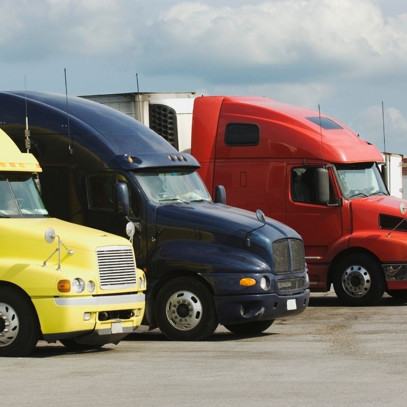 Three semi trucks