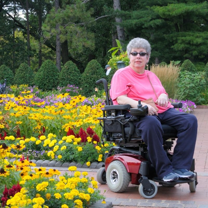 Women in motorized wheelchair